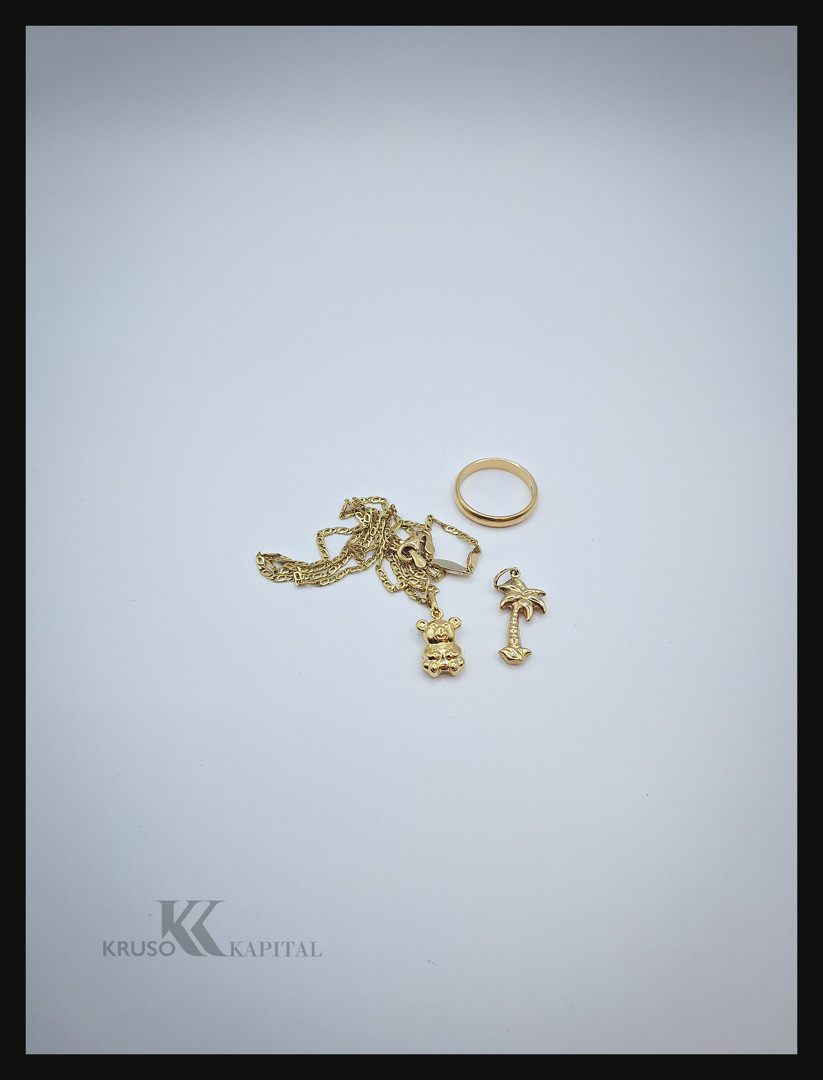 Collana anello ciondolo e pezzo oro
