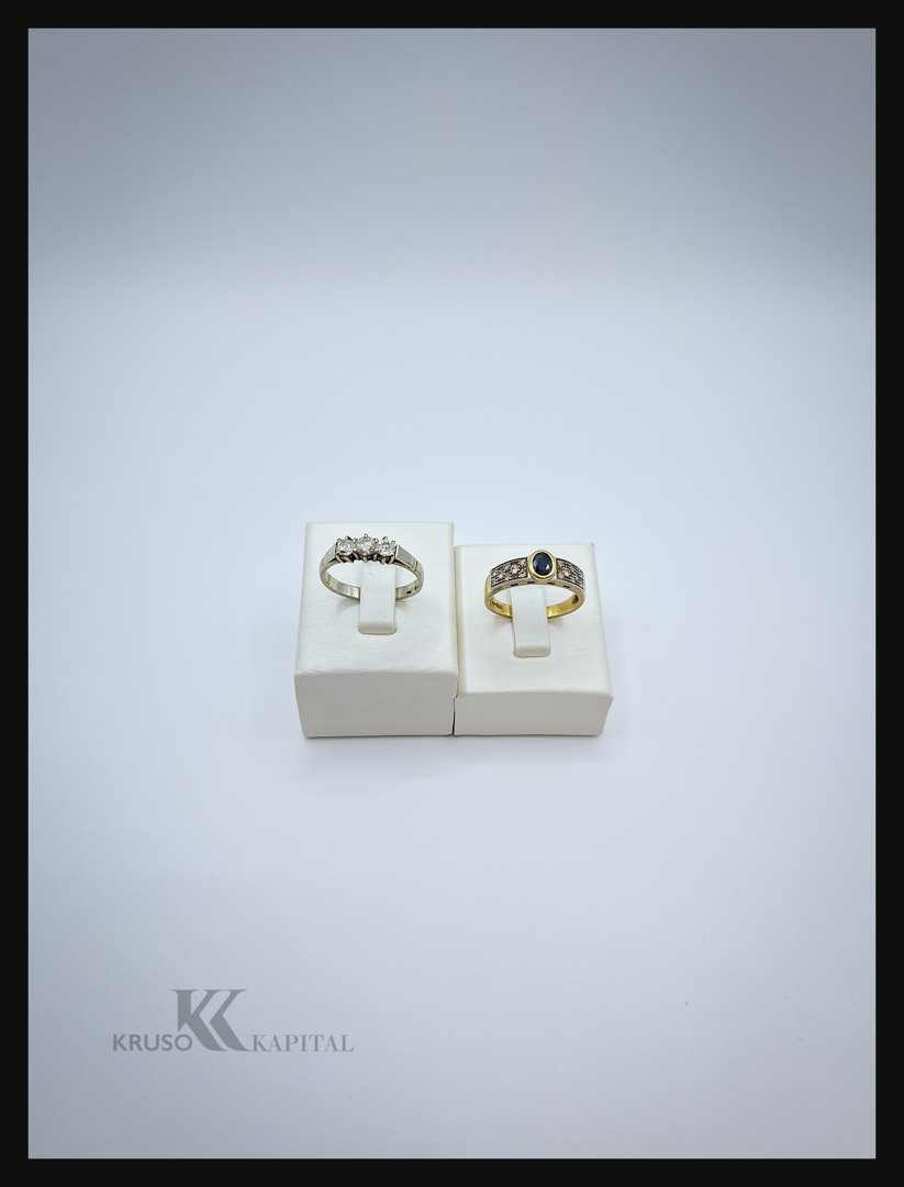 Due anelli oro pietre diamanti
