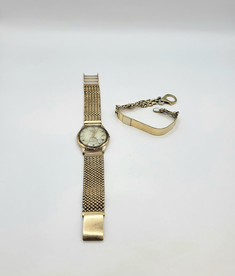 Bracciale e orologio oro