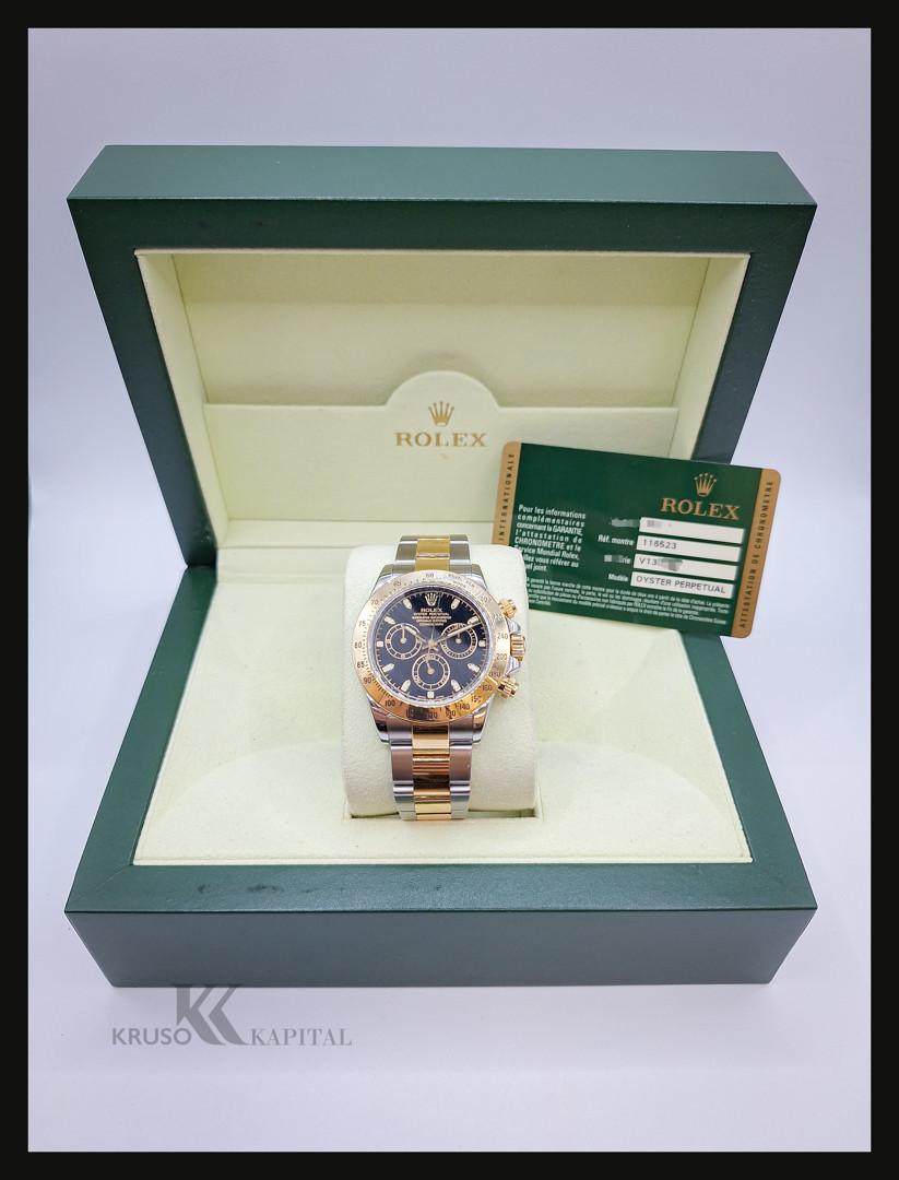 Cronografo acciaio e oro Rolex Daytona con scatola e garanzia a corredo