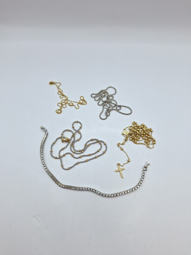 Vari oggetti in oro pietre 