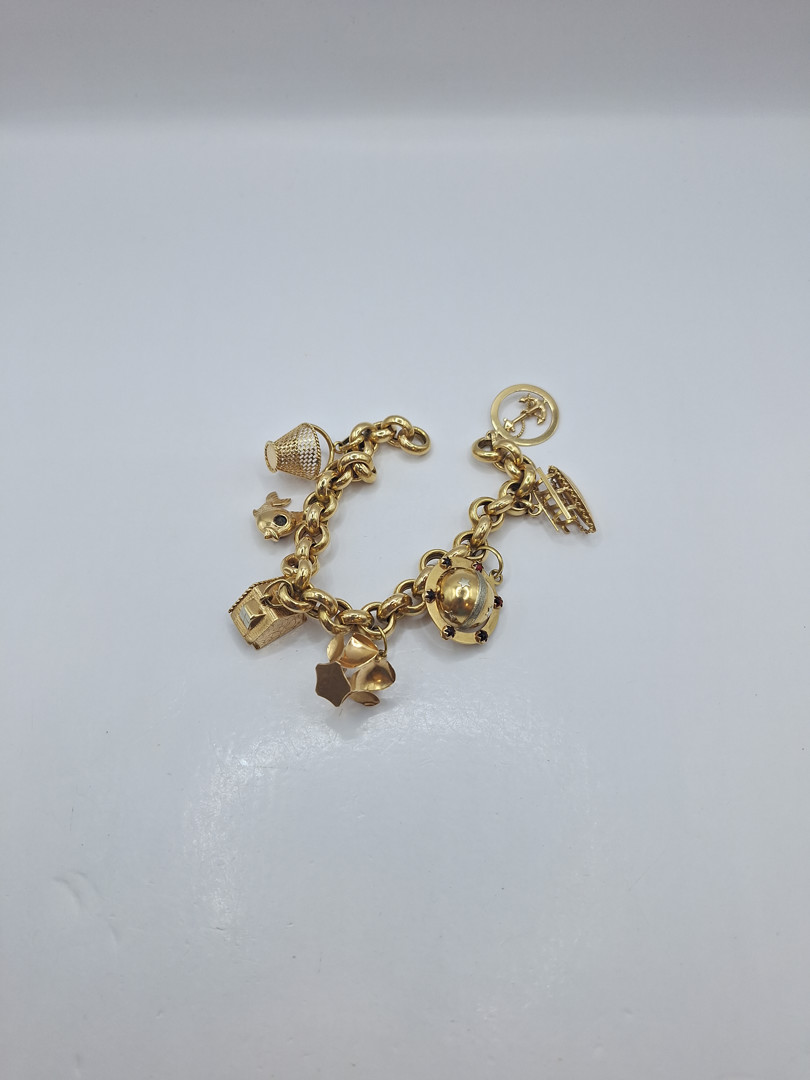 Bracciale con ciondoli oro pietre