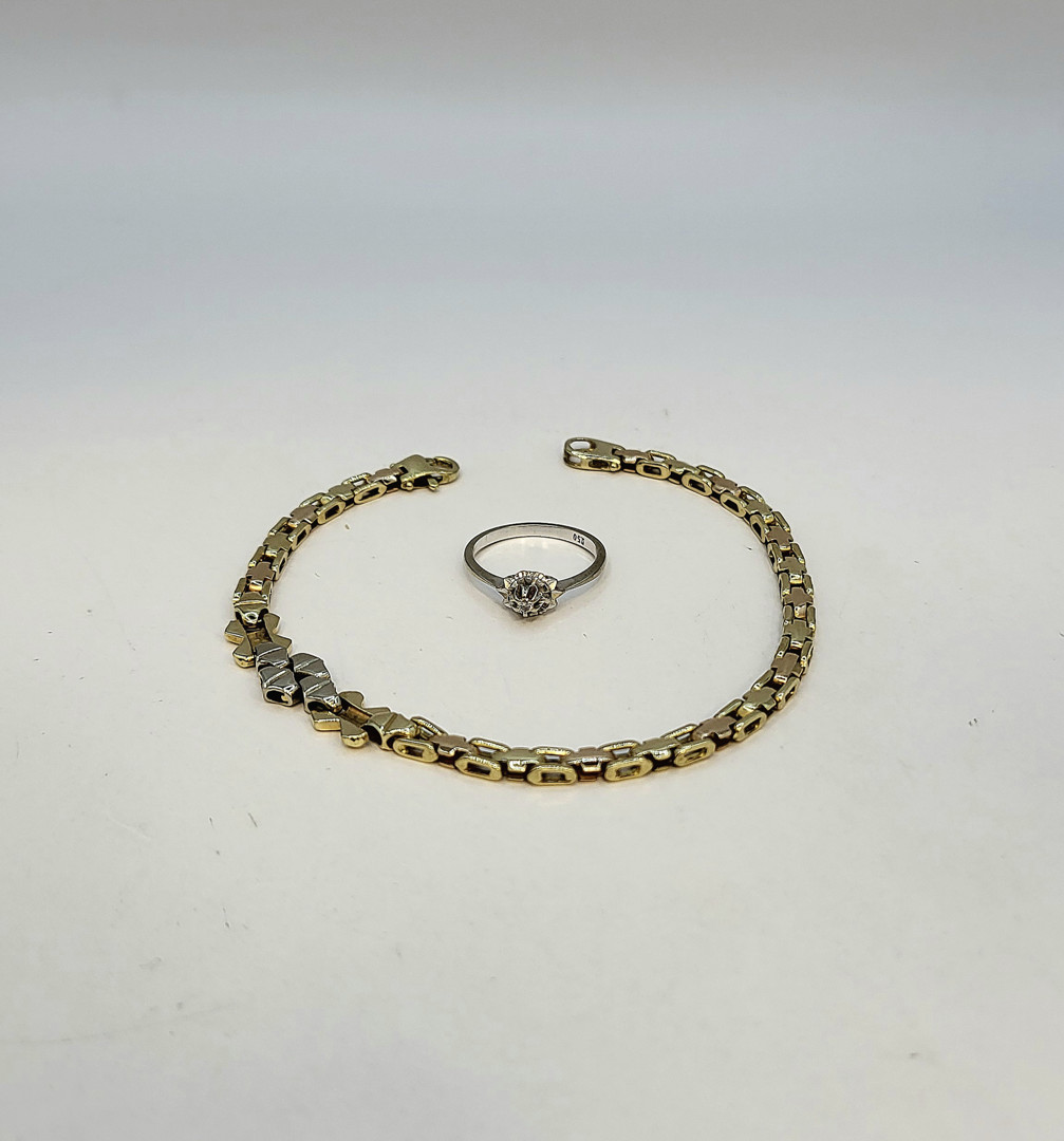 Anello e bracciale oro diamantino