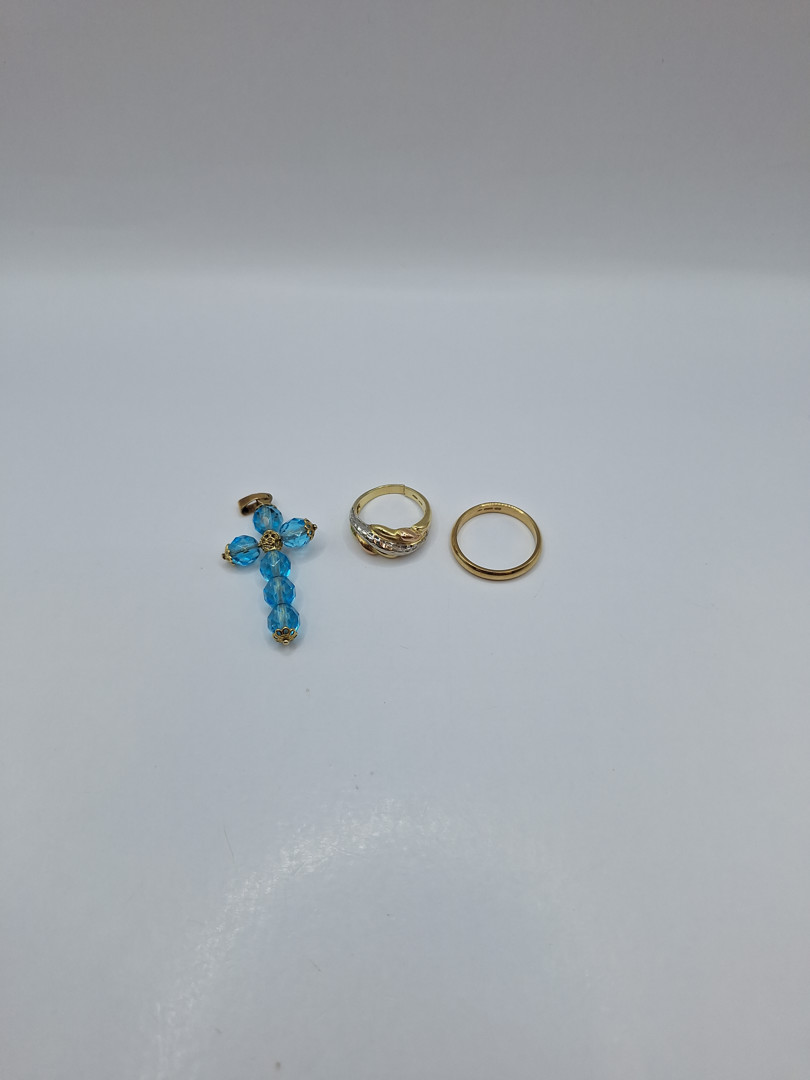 Due anelli e croce oro pietre