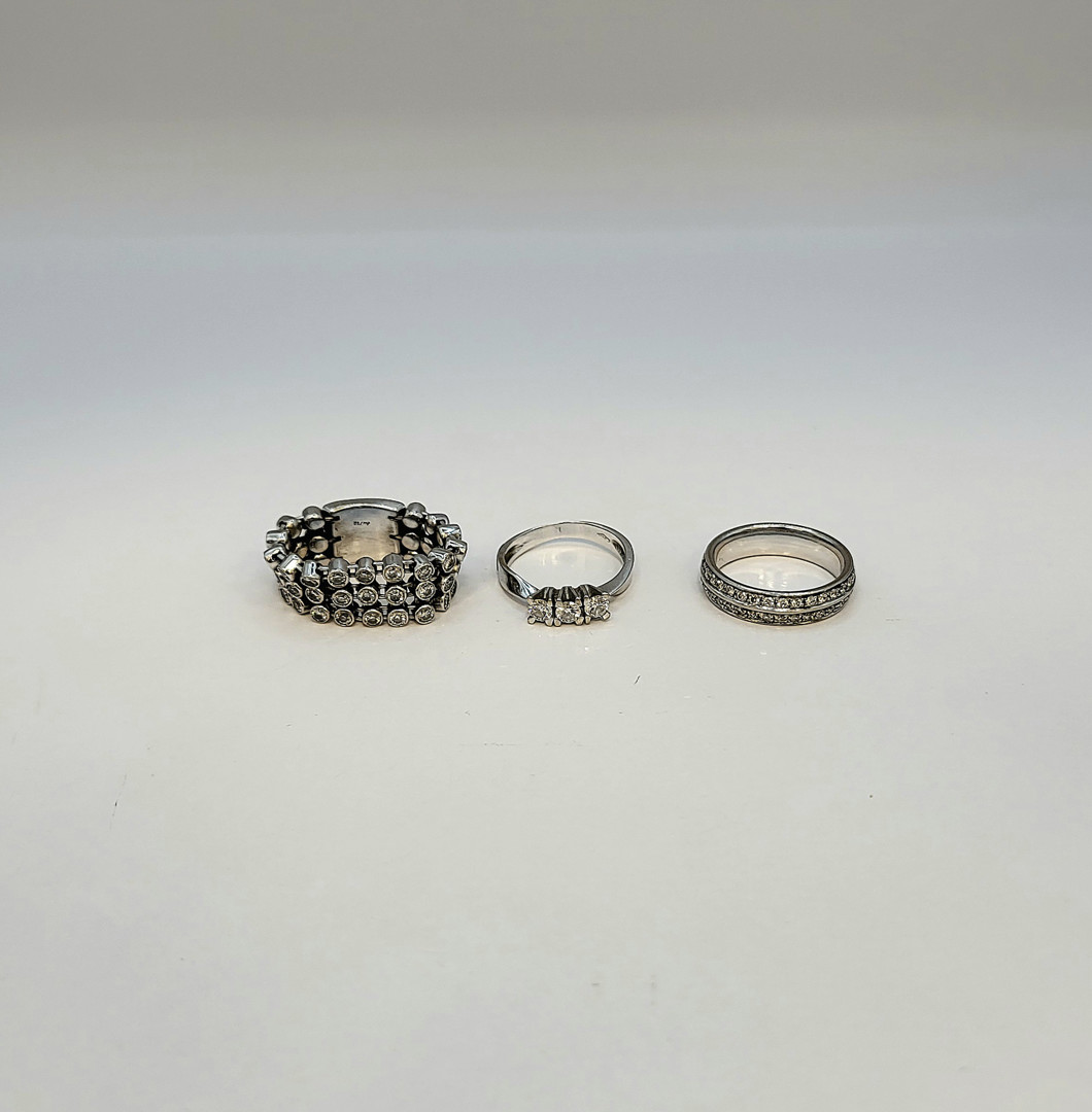 Tre anelli oro diamantini