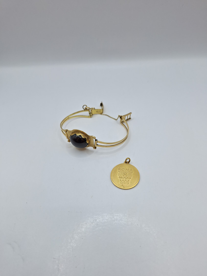 Bracciale e ciondolo oro pietra