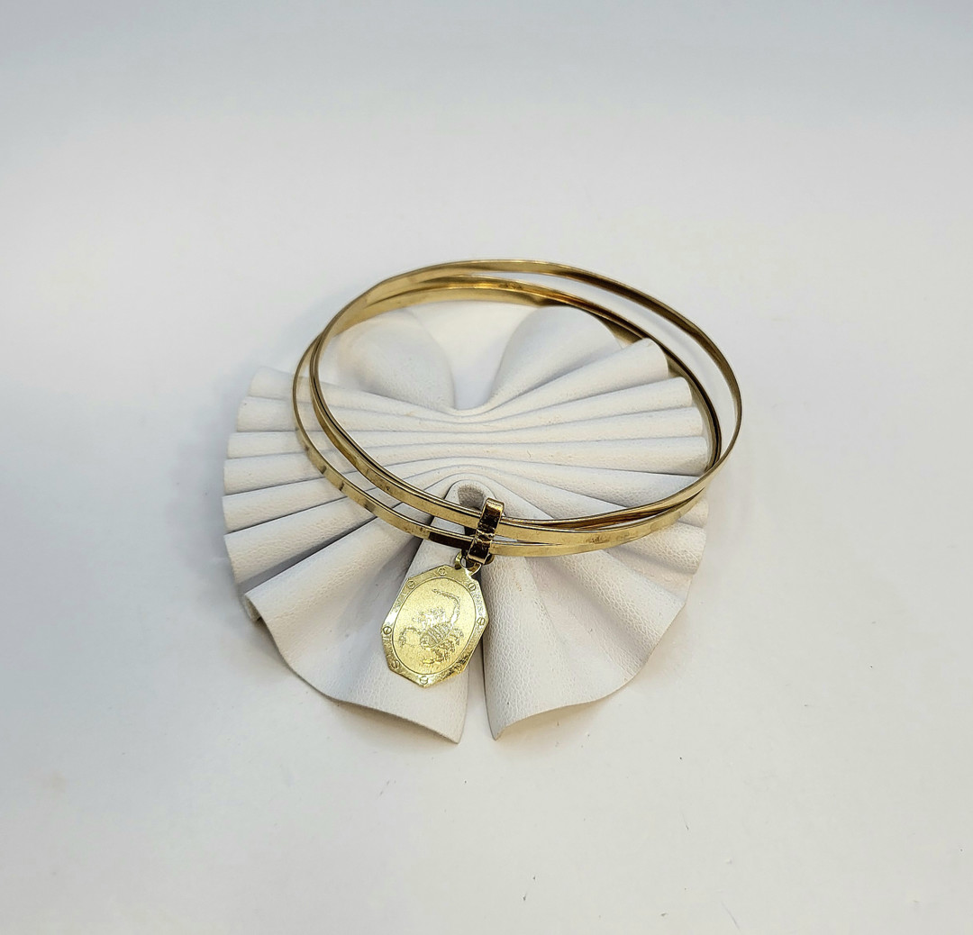 Bracciale e ciondolo oro 