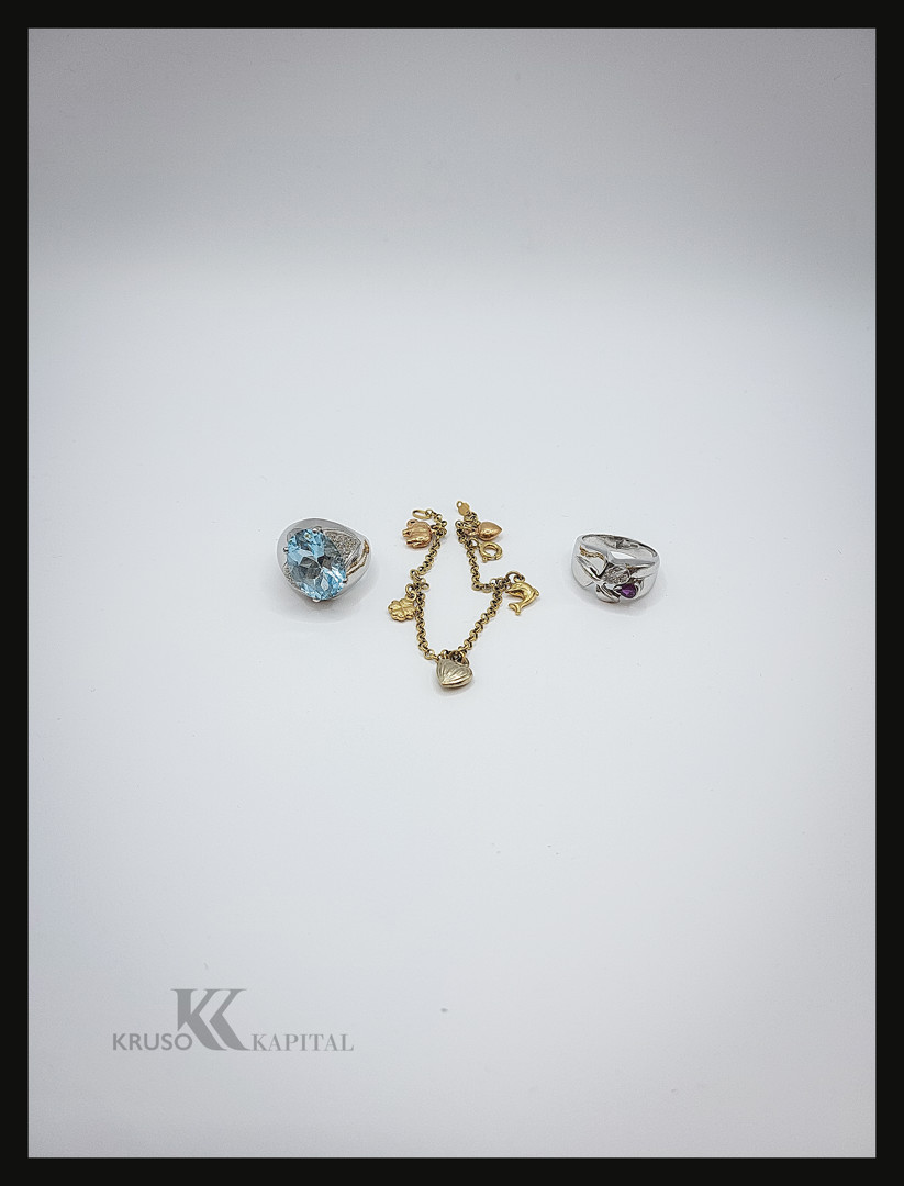 Due anelli e bracciale oro pietre diamantini
