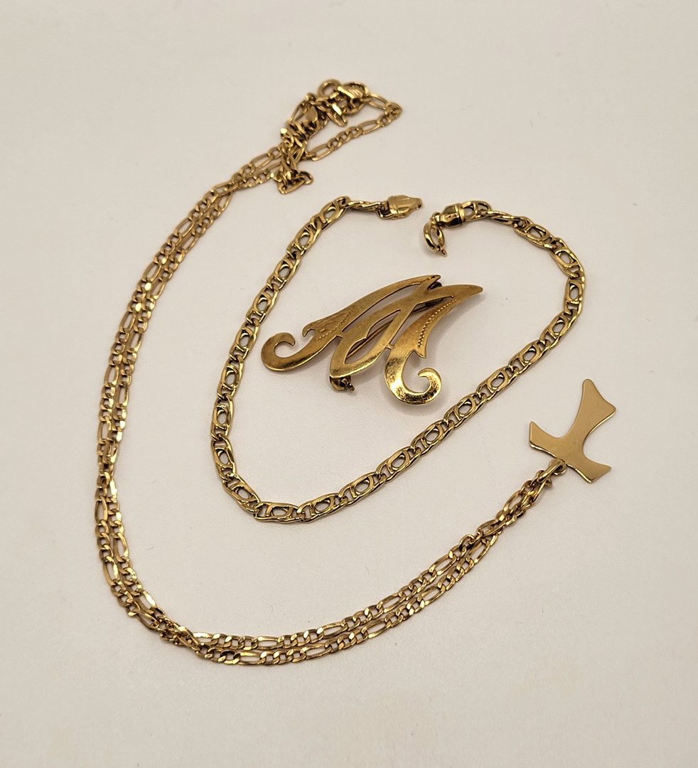 Collana braccialetto e spilla oro 