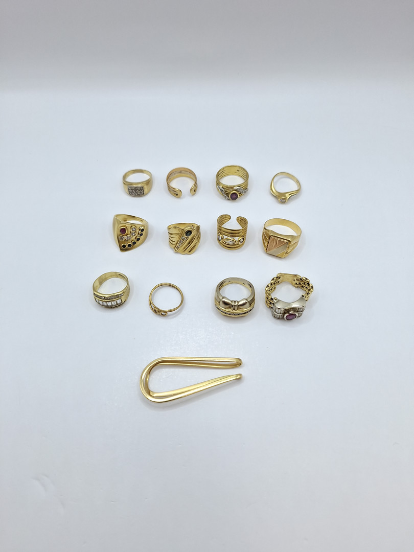 Dodici anelli e ferma soldi oro pietre diamantini