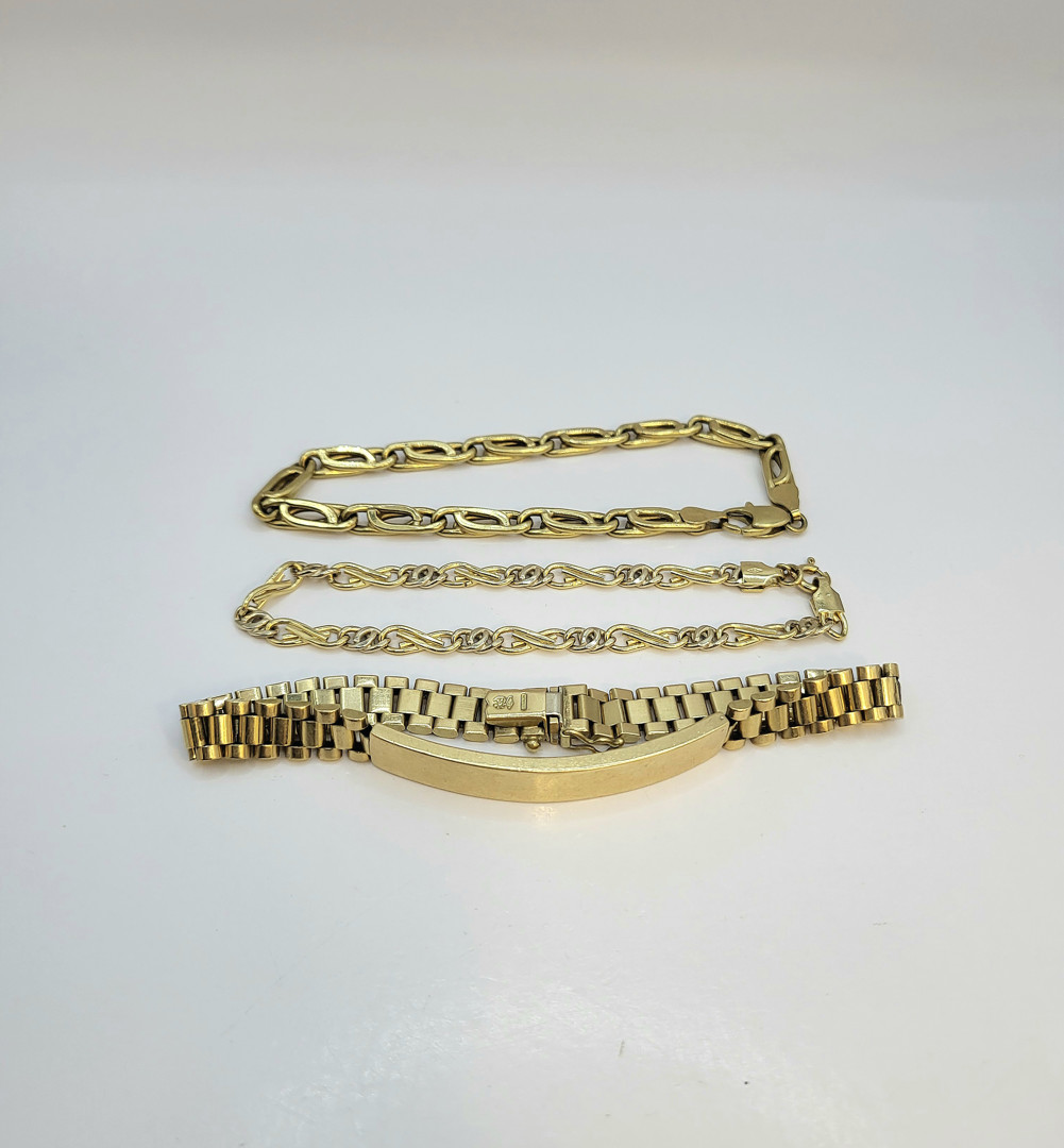 Tre bracciali oro