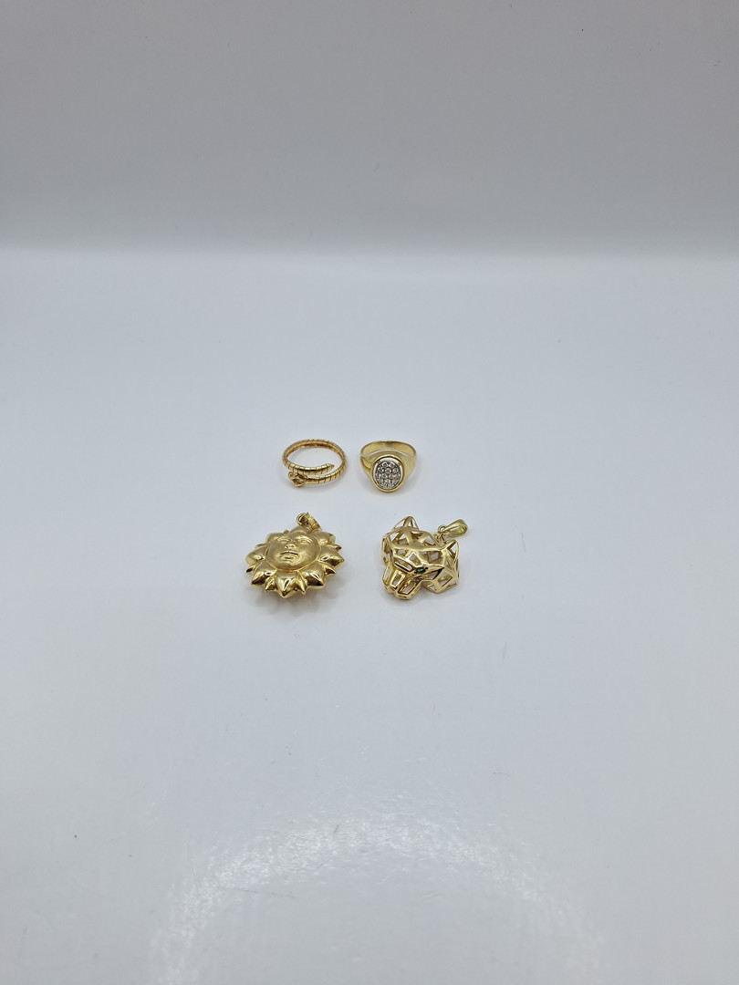 Due anelli e due ciondoli oro diamantini pietre 