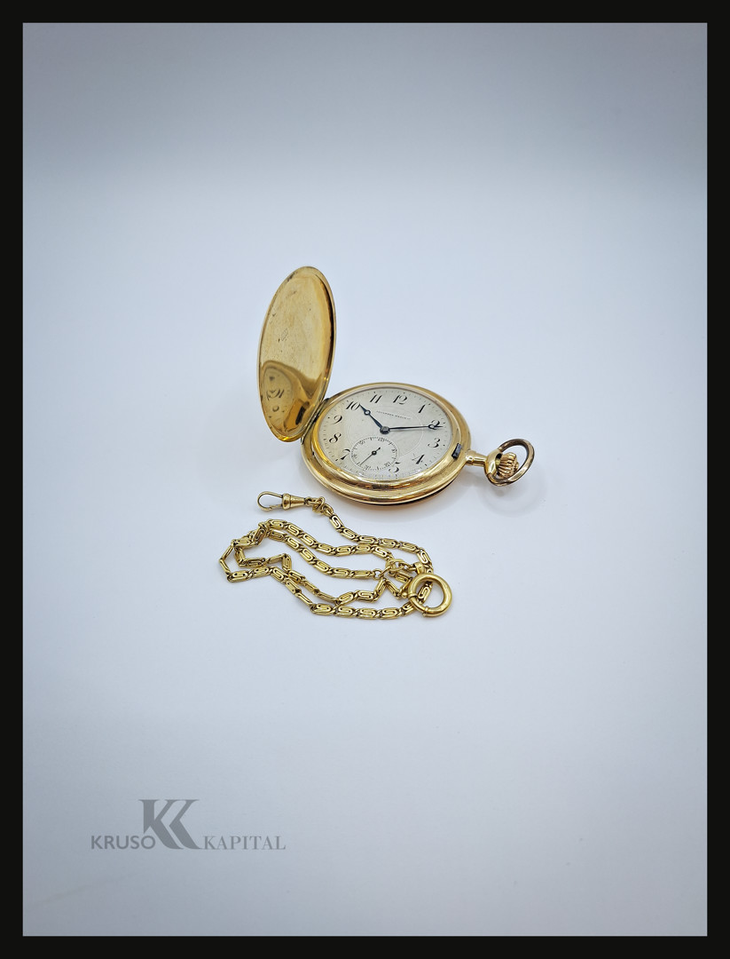 Catena e orologio da tasca in oro 
