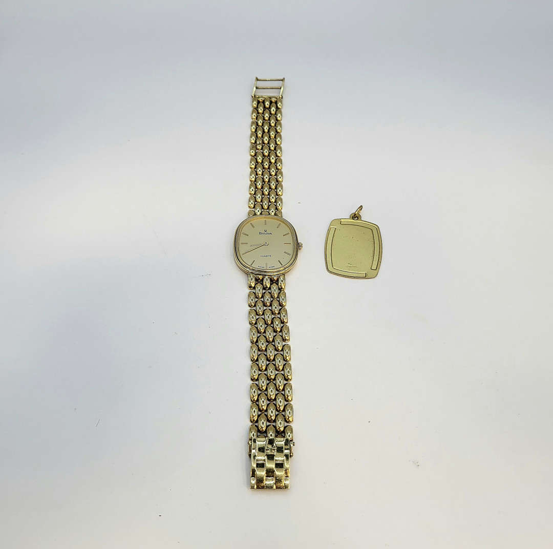 Ciondolo e orologio oro