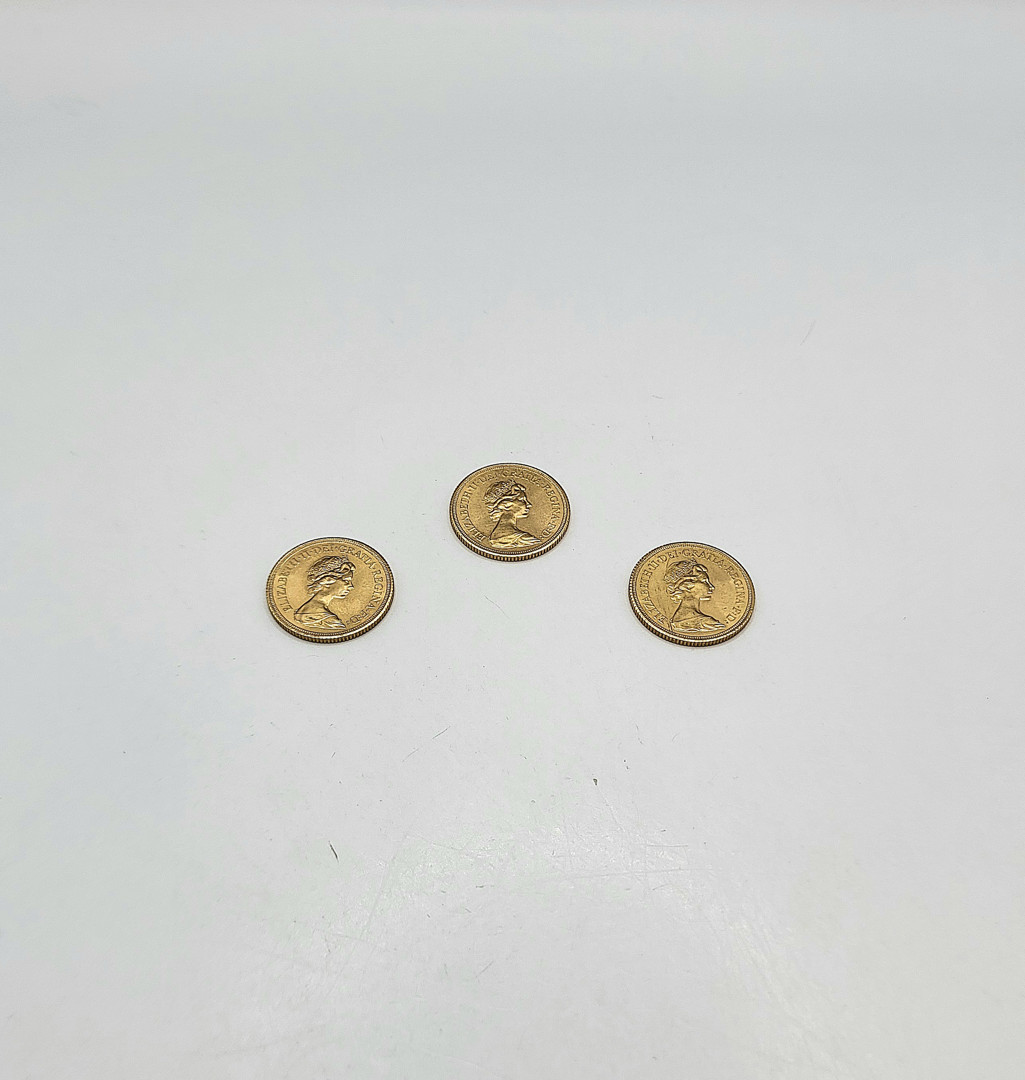 Tre pezzi oro monetato
