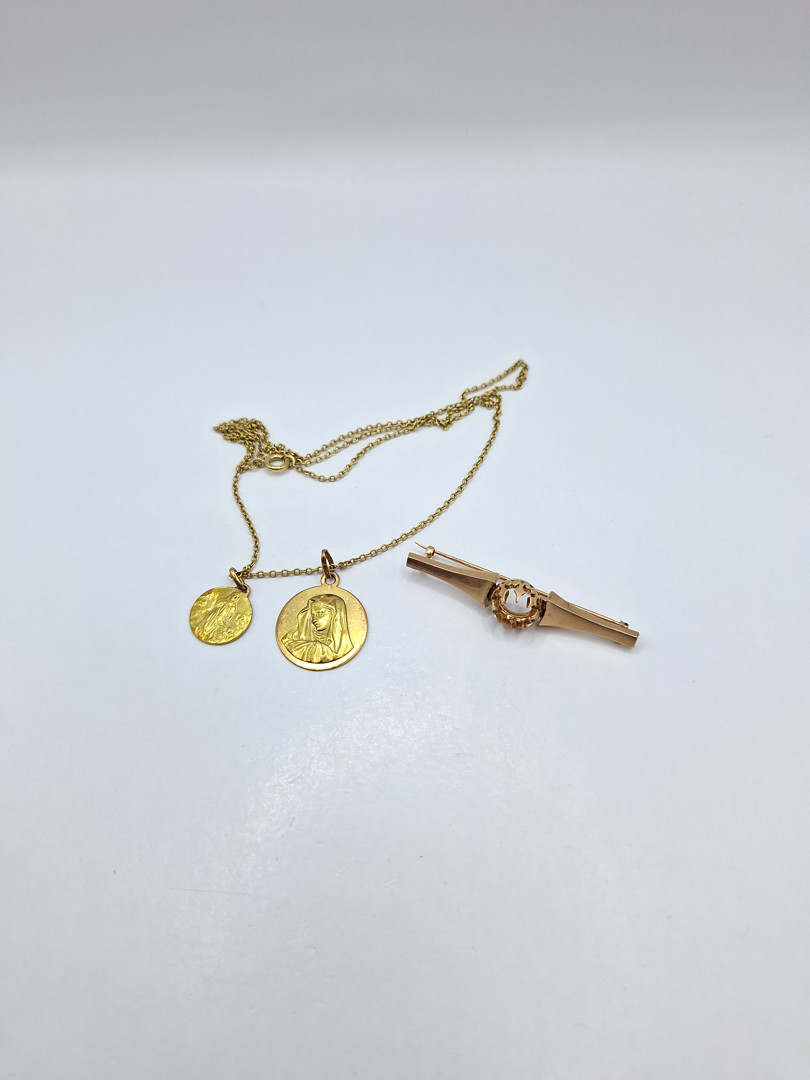 Collana due ciondoli e spilla in oro 