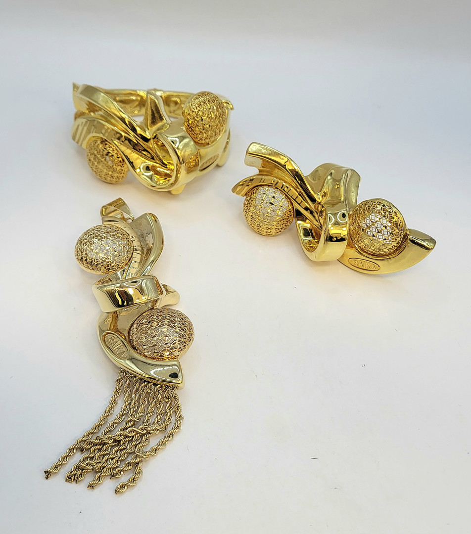 Bracciale ciondolo e anello oro 