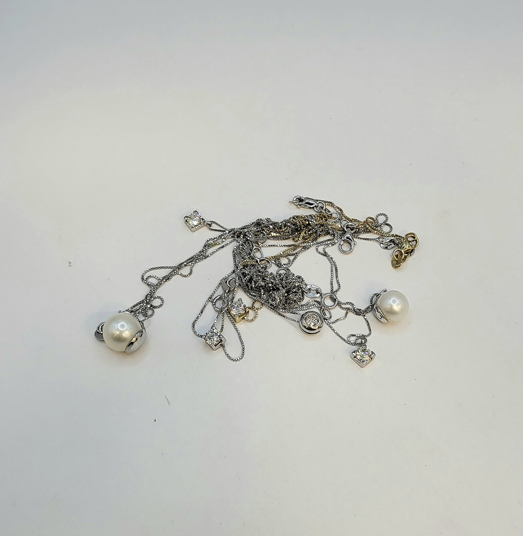 Catenine con ciondoli oro pietre perle diamanti