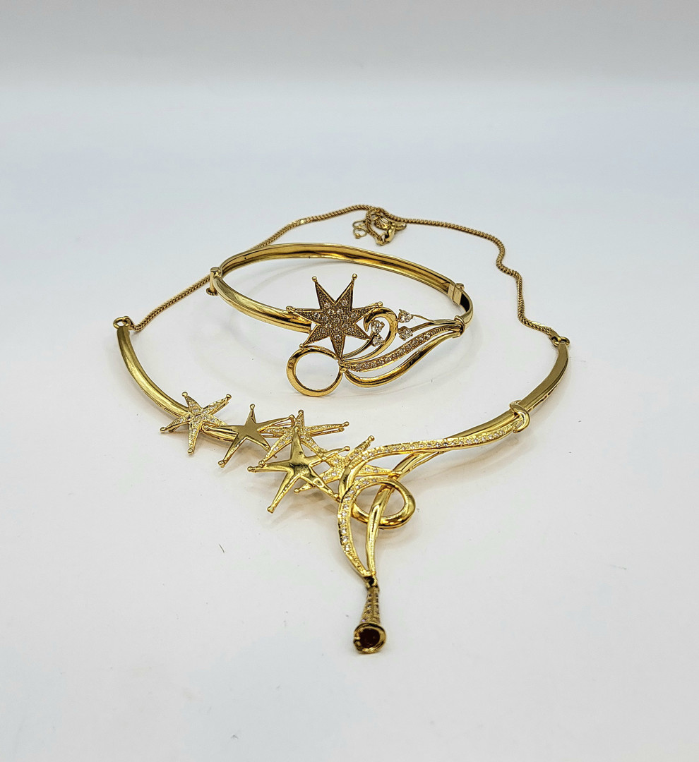 Collana e bracciale oro pietre