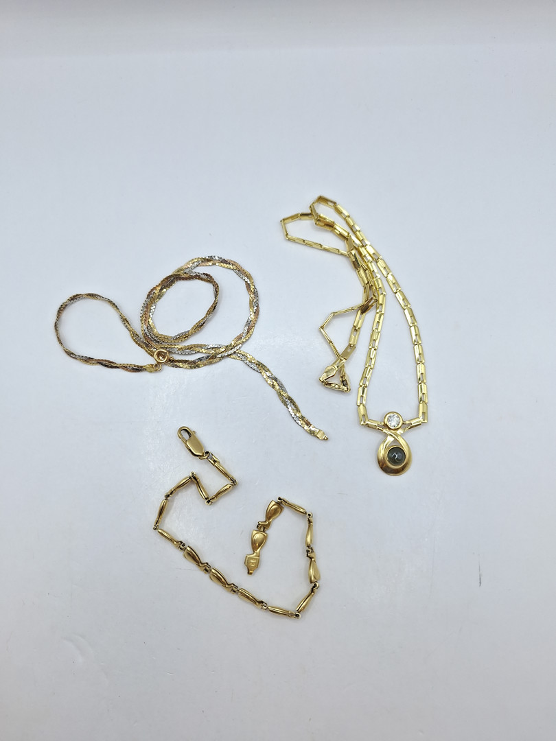 Due collane e bracciale oro pietre