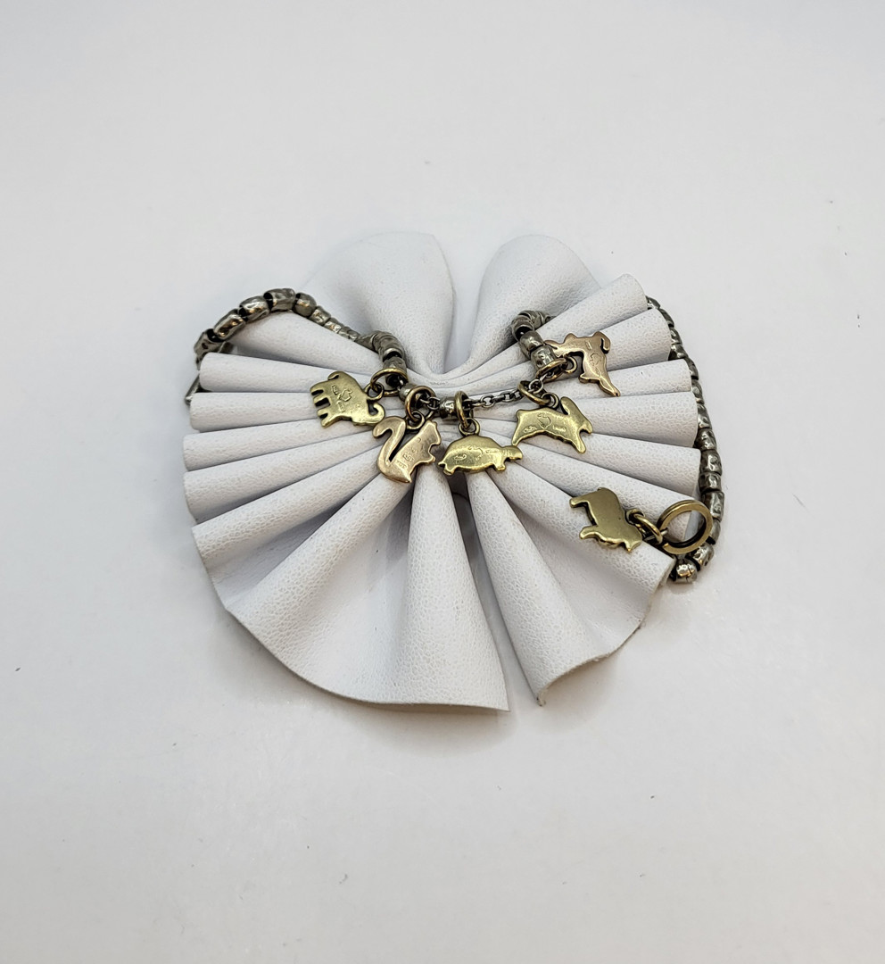 Bracciale argento  con ciondoli  oro Dodo