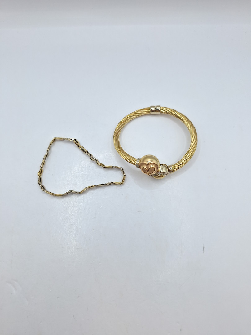 Due bracciali oro pietre 