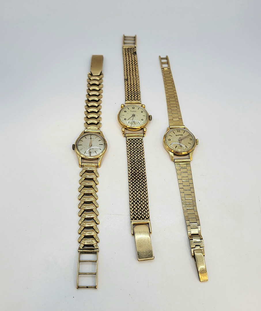 Tre orologi oro