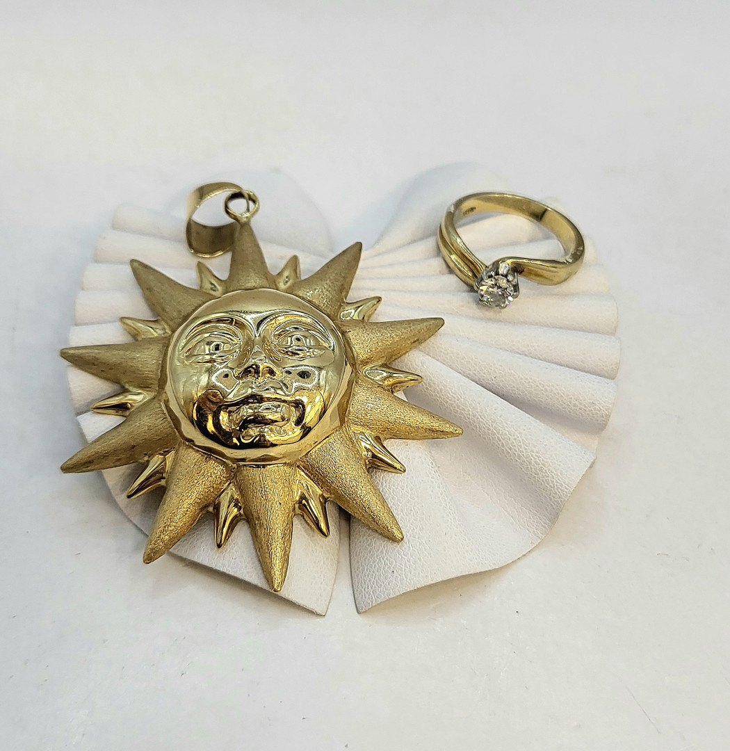 Anello e ciondolo oro diamante