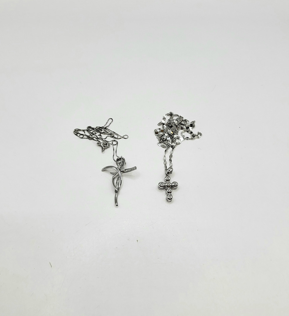 Due catenine e due croci oro diamantini