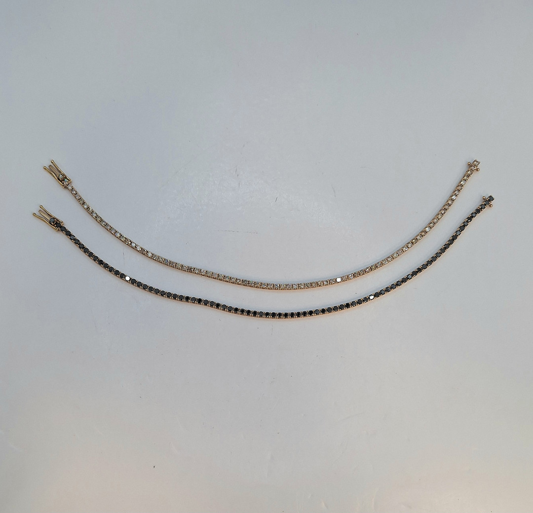 Due bracciali oro diamantini