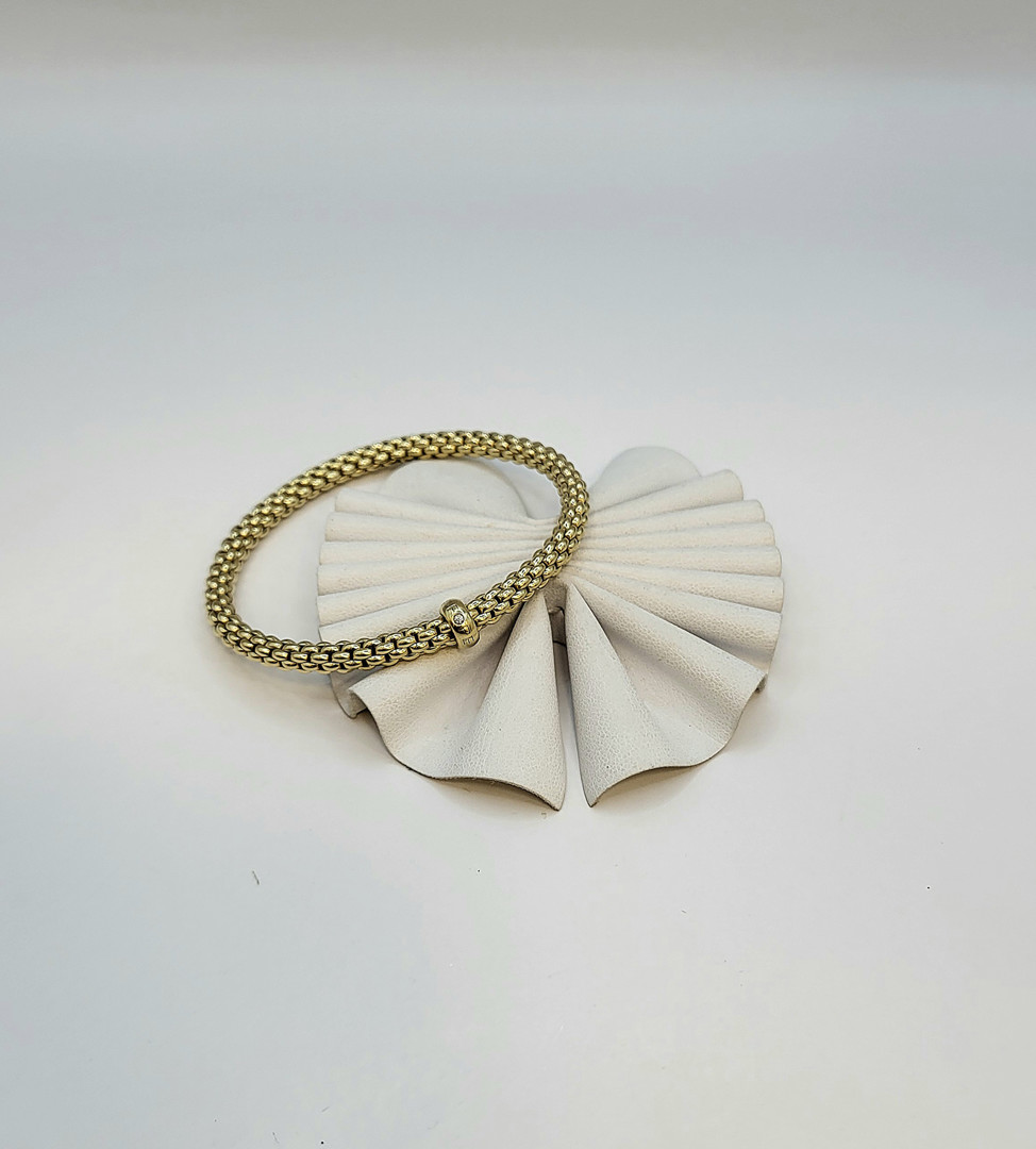 Bracciale a firma Fope oro diamantino