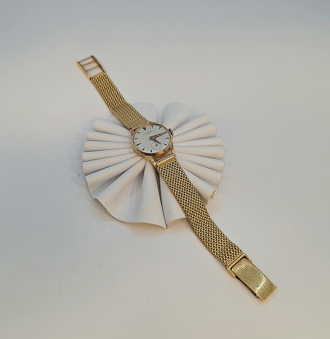 Bracciale con orologio oro 