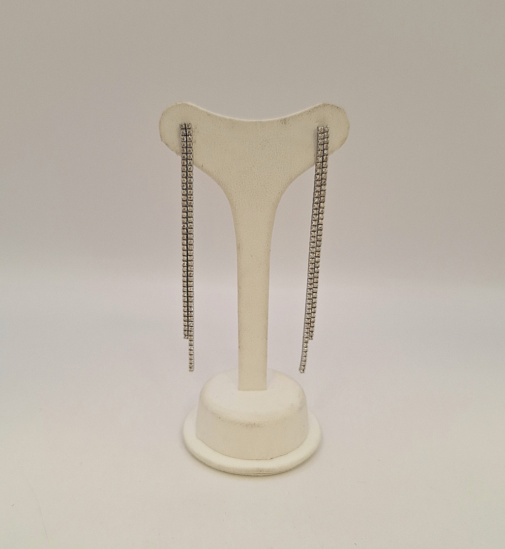 Un paio orecchini oro diamantini