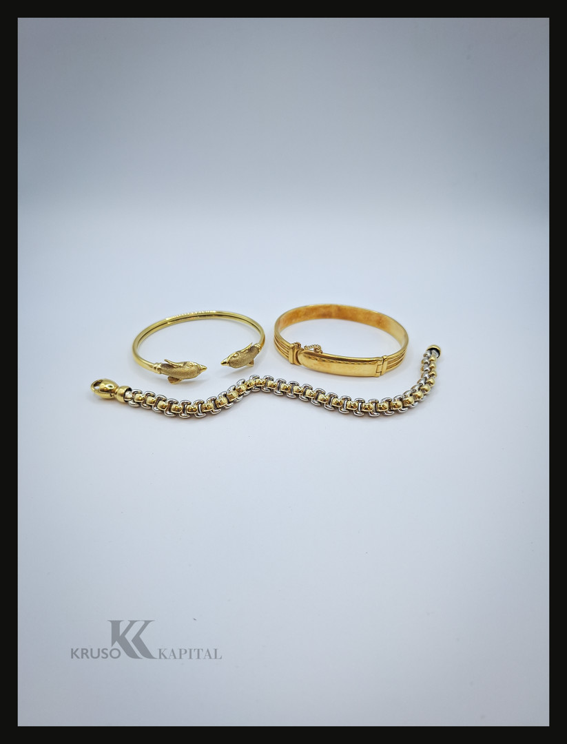 Tre bracciali oro