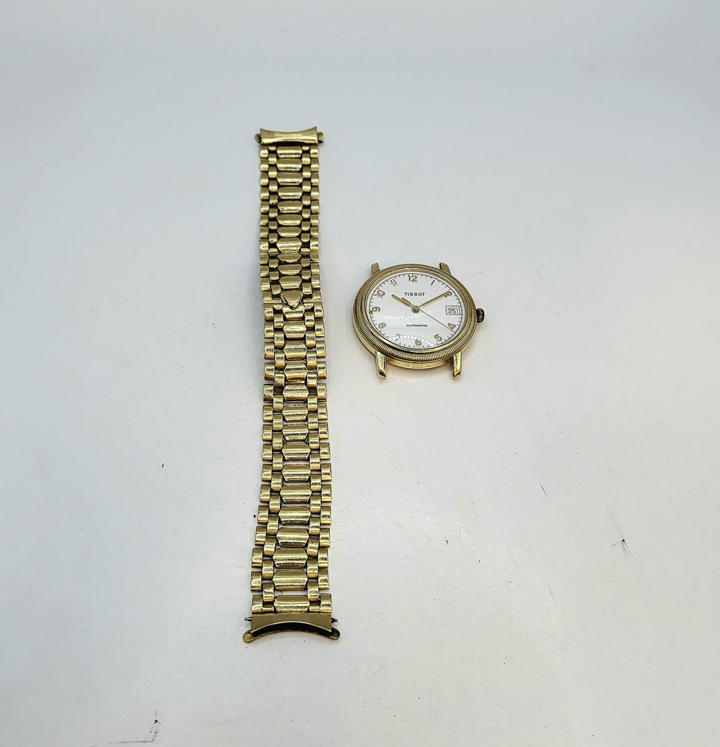 Orologio Tissot e bracciale per orologio oro
