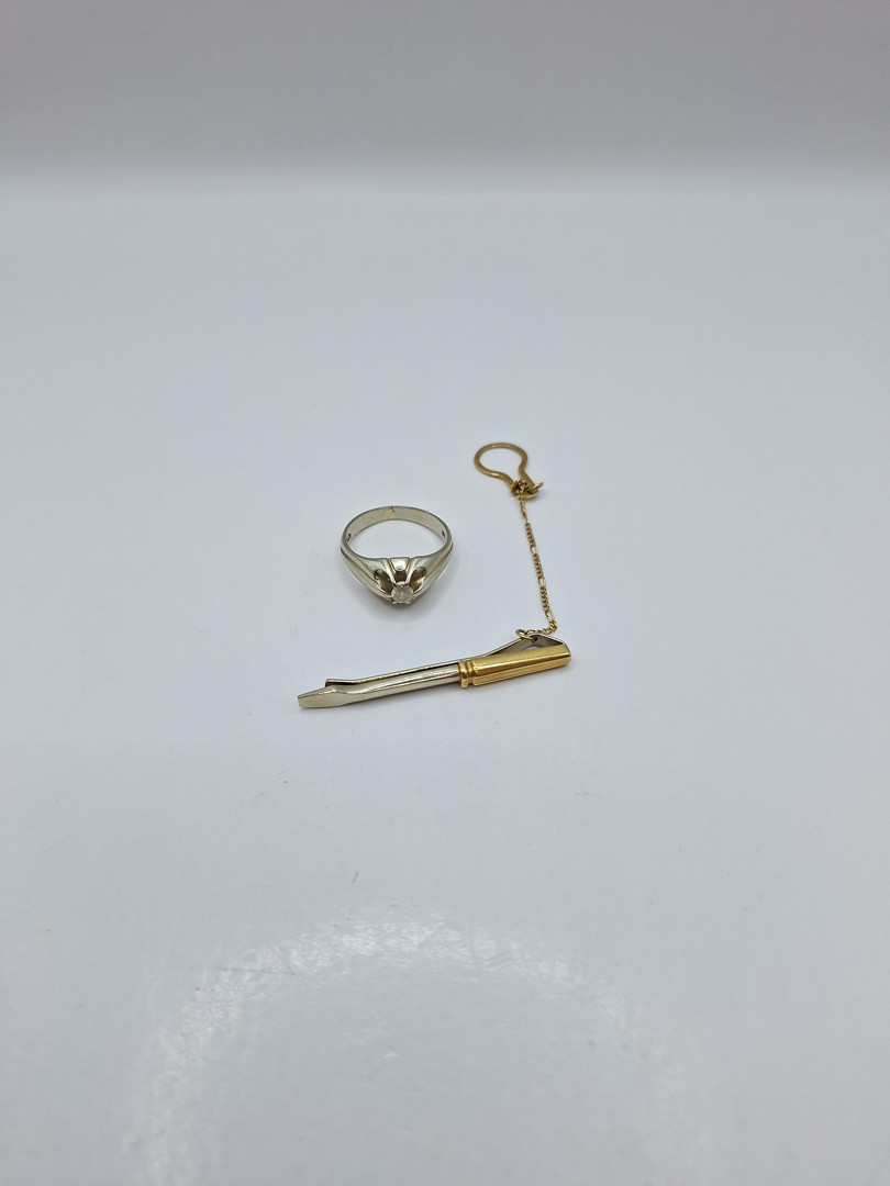 Fermacravatta e anello in oro pietra 