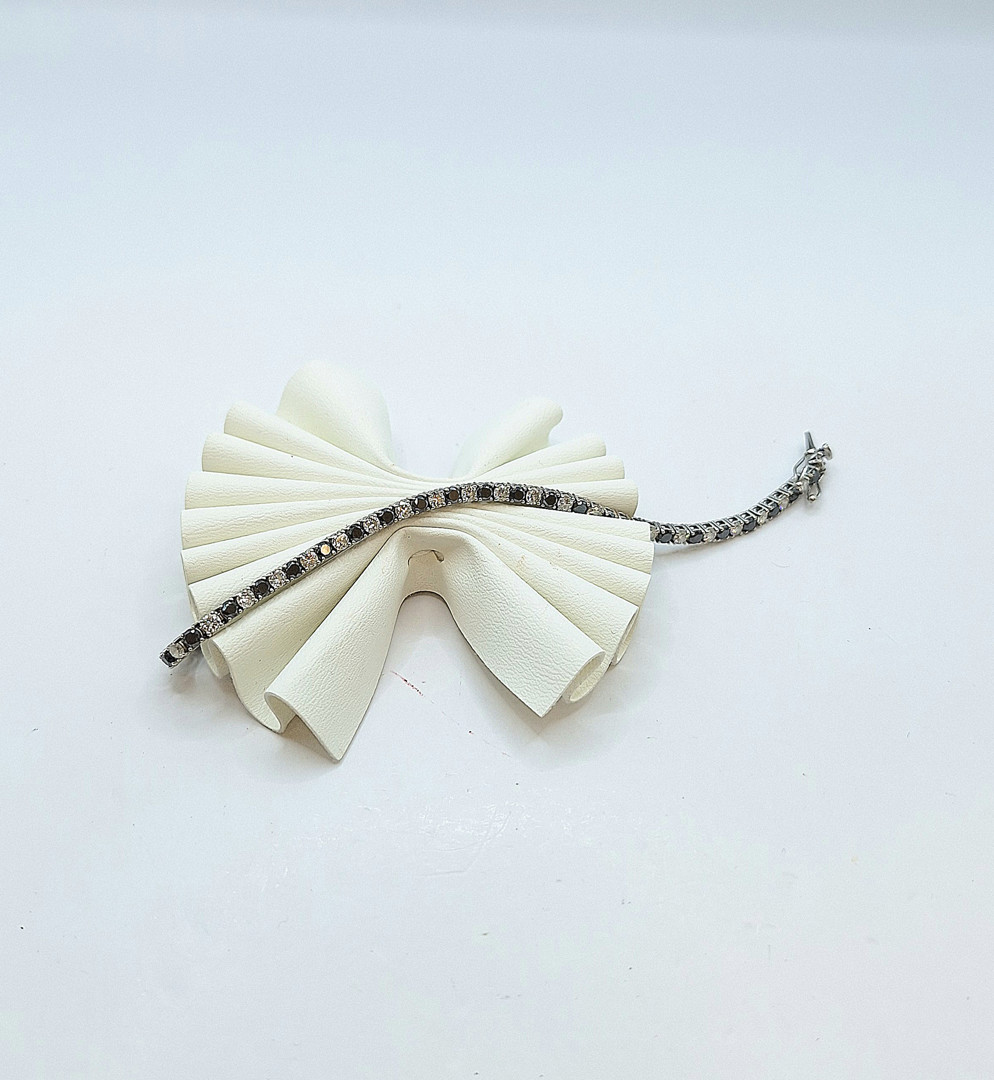 Bracciale tennis oro diamanti bianchi e neri