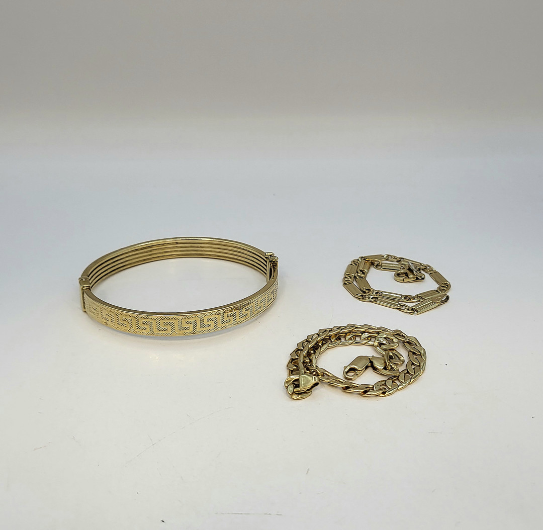 Tre bracciali oro