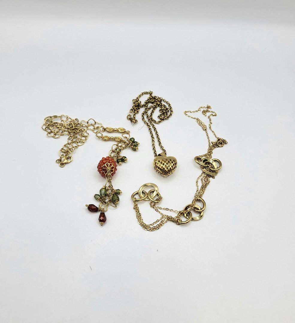 Tre collane e ciondolo oro pietre