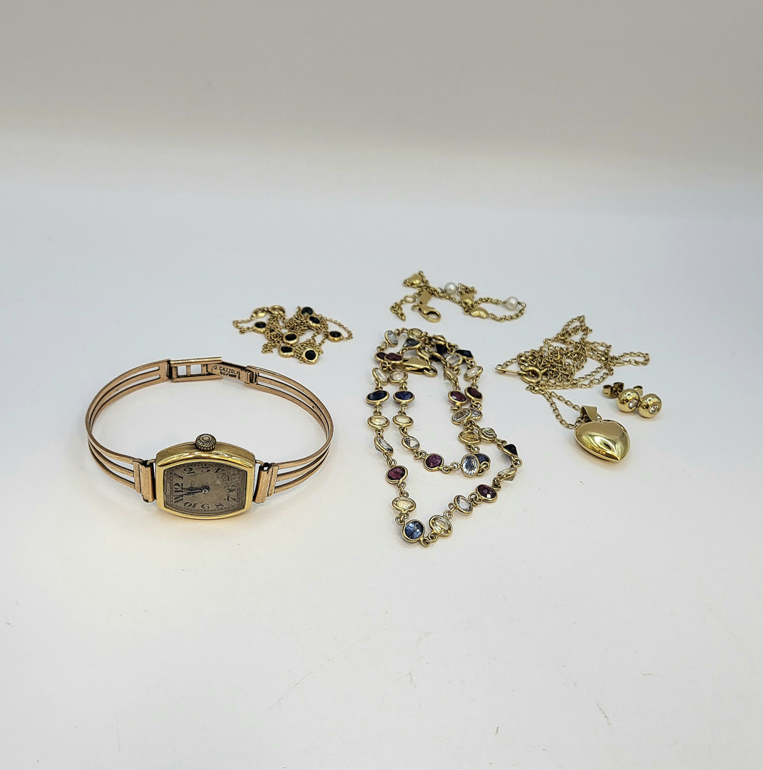 Vari oggetti oro pietre