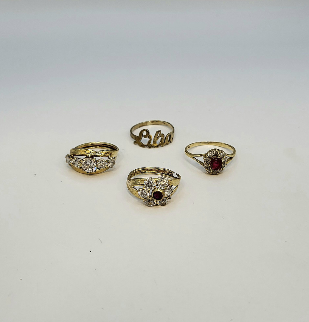 4 anelli oro pietre