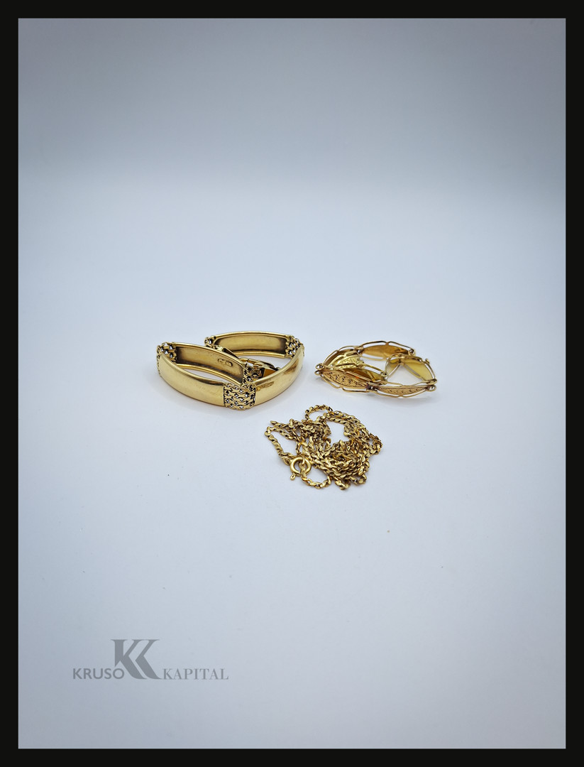 Collana due bracciali oro