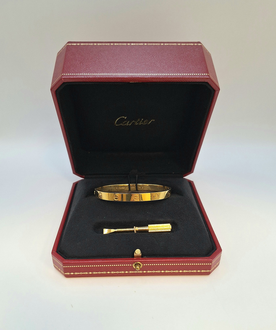 Bracciale a firma Cartier oro 