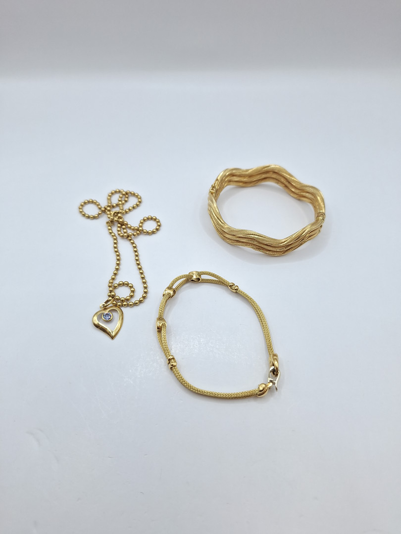 Due bracciali collana e ciondolo in oro pietra 