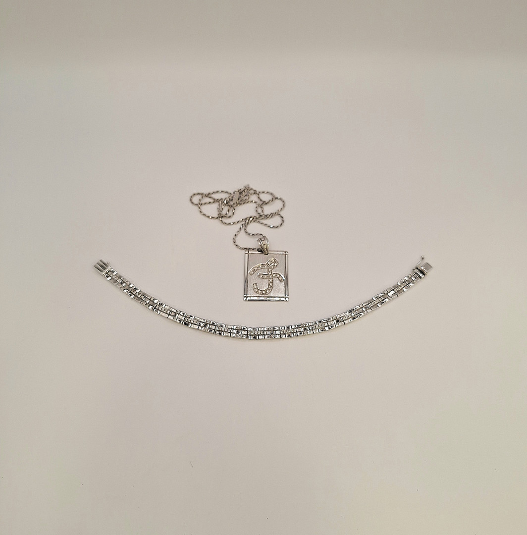 Bracciale collana e ciondolo oro diamantini 