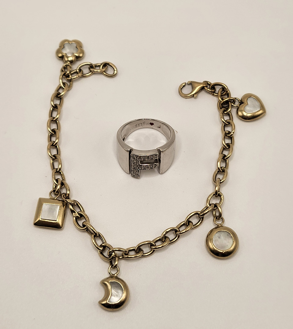 Anello e bracciale oro diamante pietre