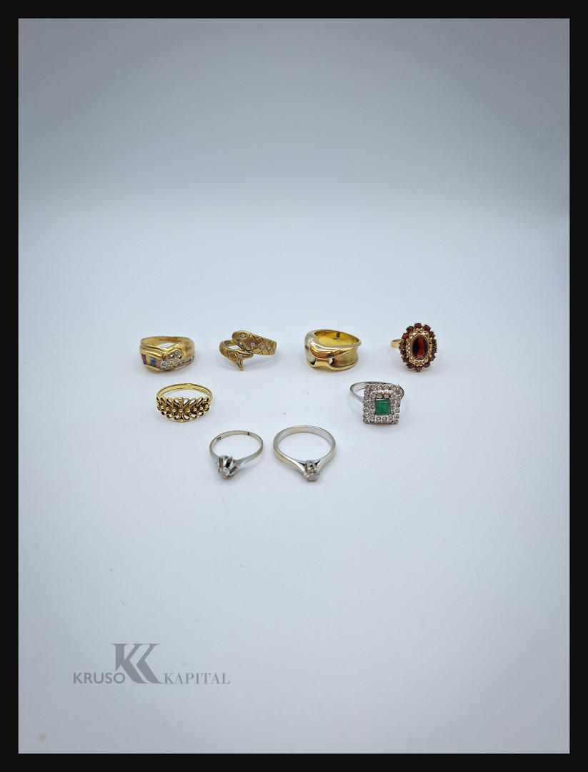 Otto anelli oro diamanti pietre