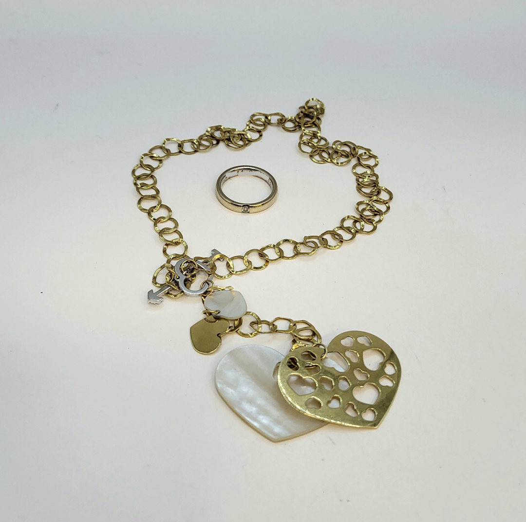 Anello a firma Damiani e collana oro pietre diamantini