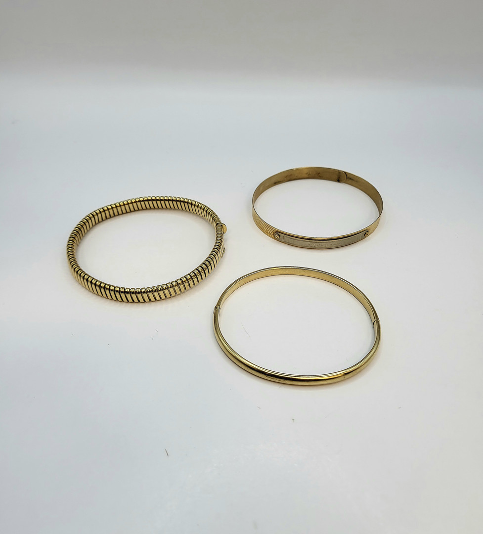 Tre bracciali oro 