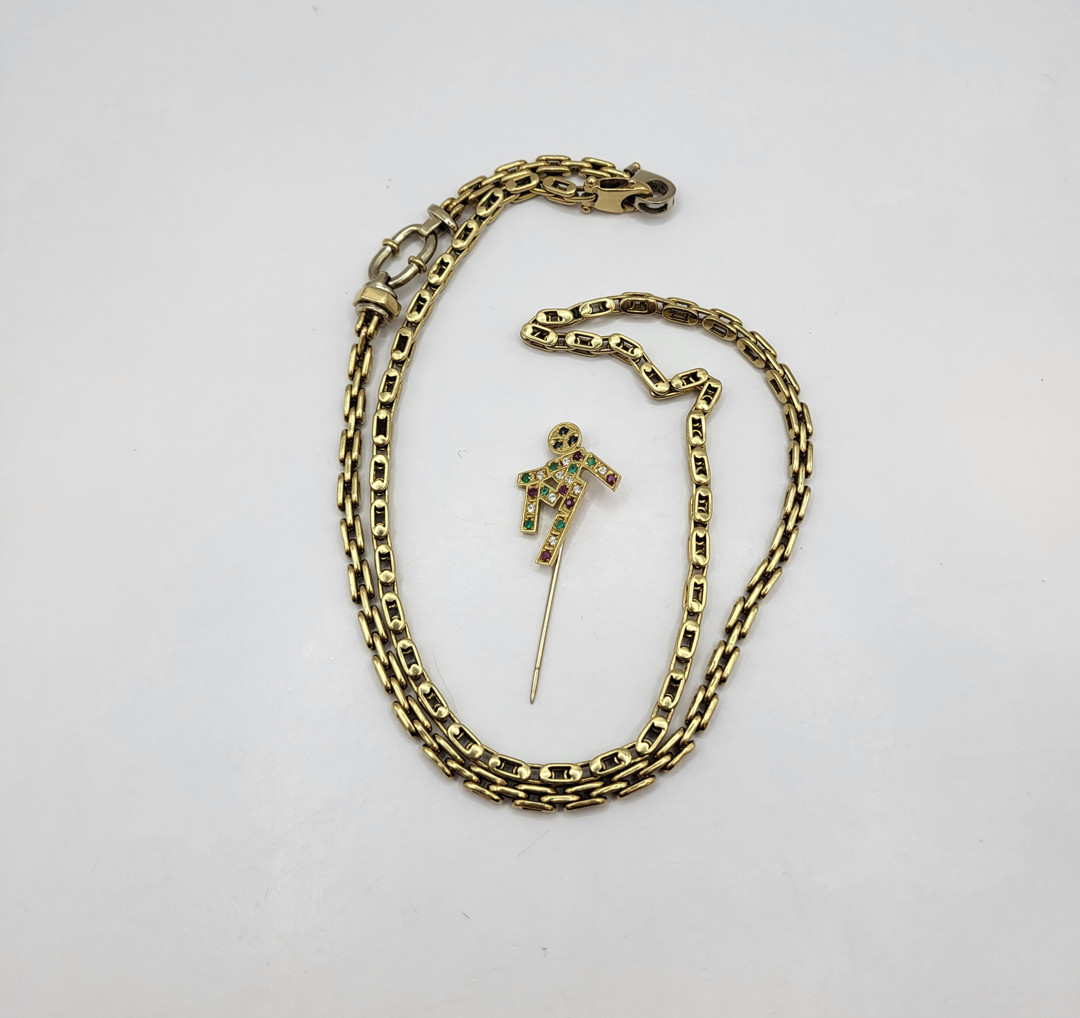 Collana e spilla oro pietre